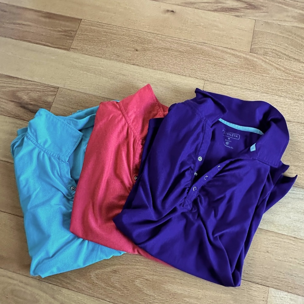 Three Athleta Med golf shirts or tennis shirts , light wear